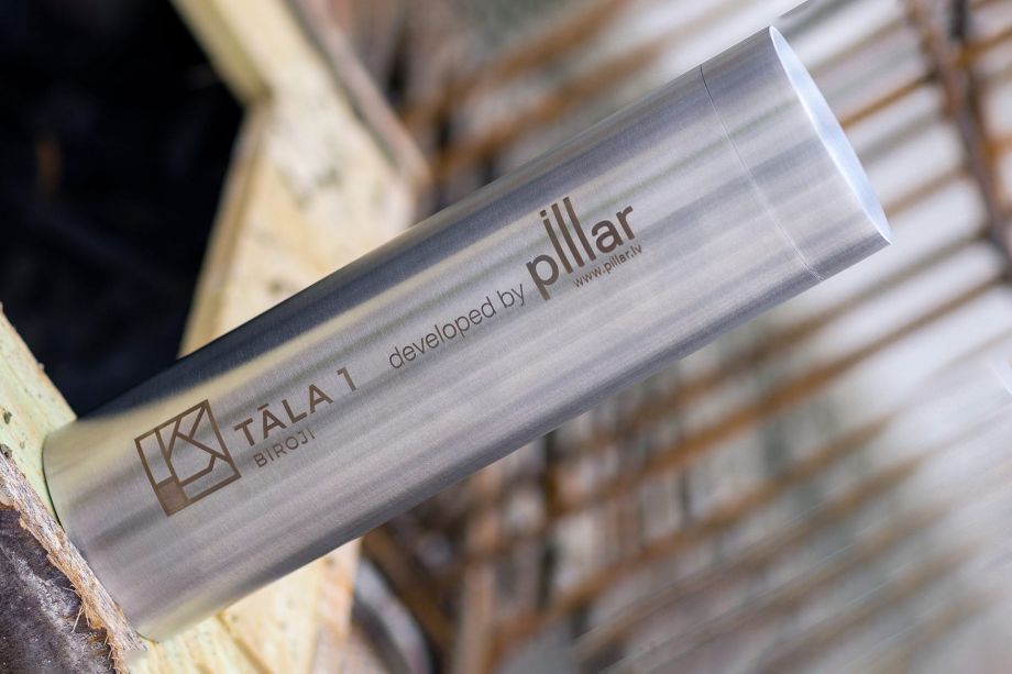 Putting Timecapsule in Foundation of New Hanza Office Building at 1 Mihaila Tāla St.